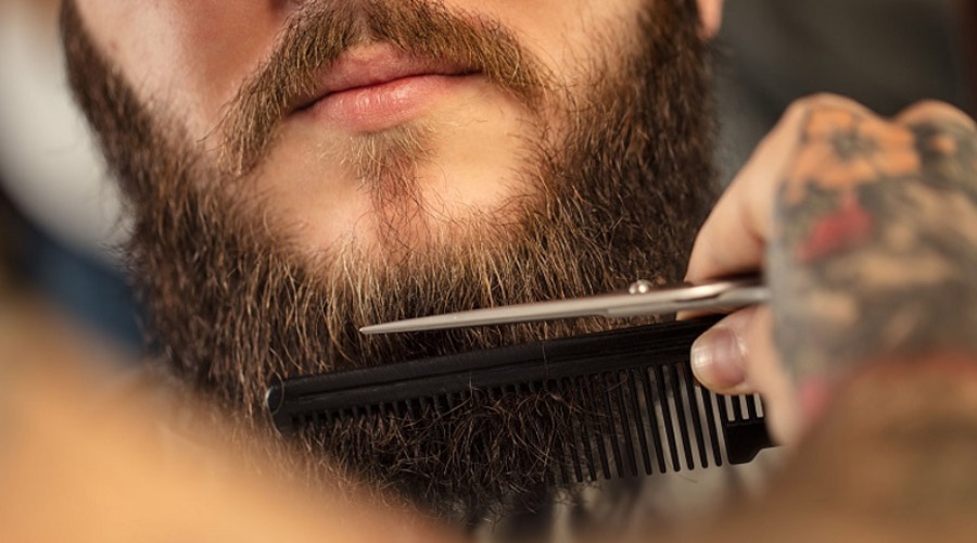 cleaning beard using a clean towel, better facial care so facial hair grows healthily 