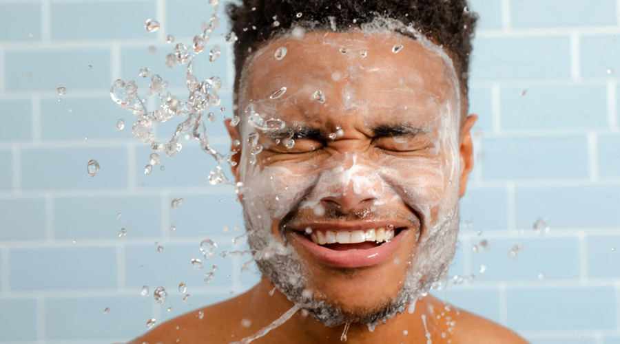 washing the face using a facial cleanser